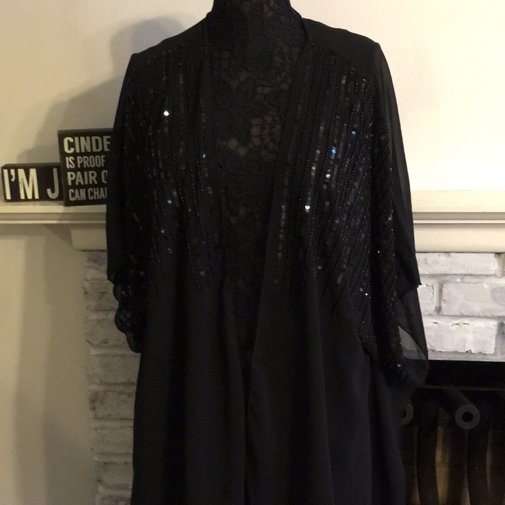 Beautiful short sleeve dress shawl.